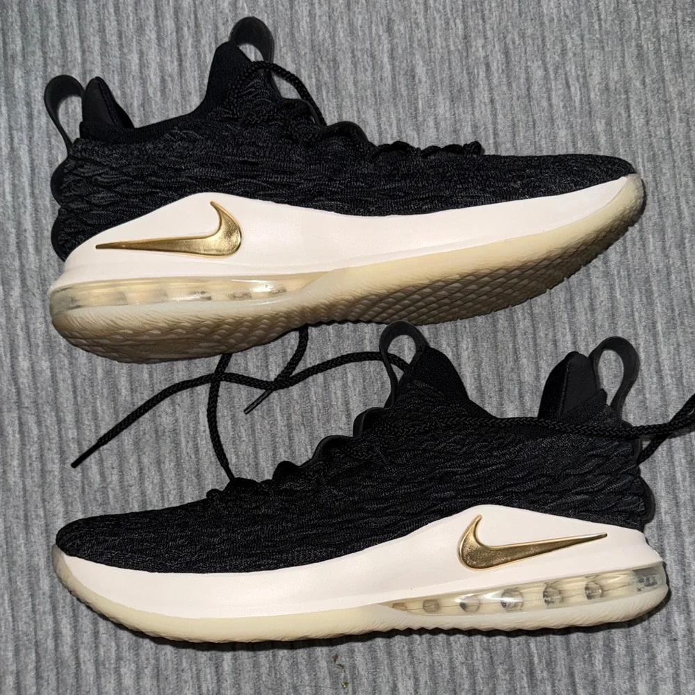 Nike LeBron 15 Low in the Black/Metallic Gold/Phantom colorway. - Picture 1 of 5